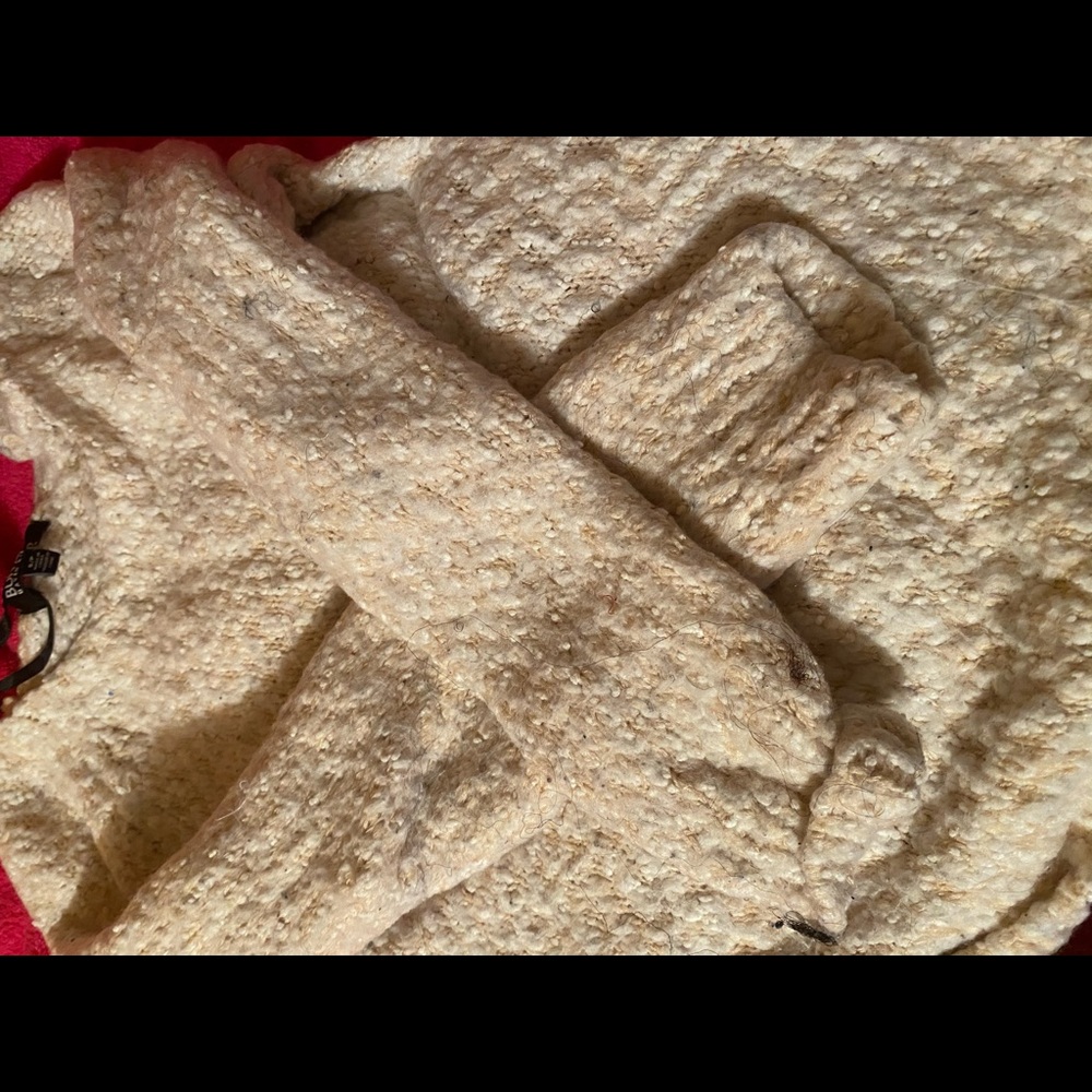 Small, tan and white pull over sweater